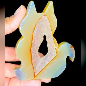 Agate cat druzy carving.
